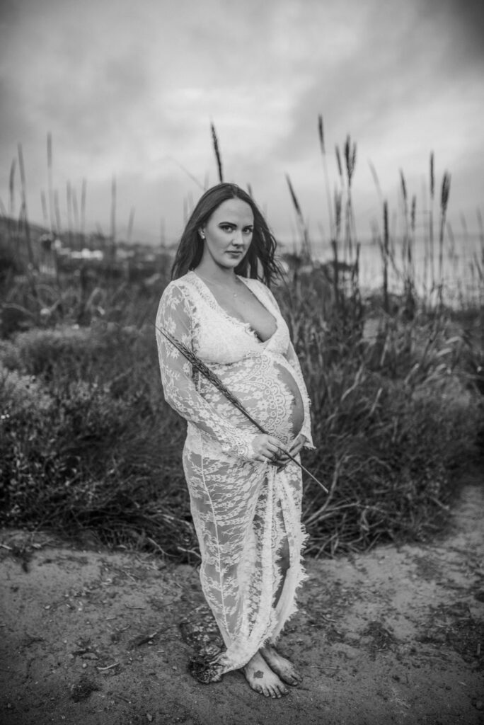 9 tip for your pregnancy. Black and white image by Dear Birth of pregnant mother among the native plants at El Matador beach, Los Angeles.