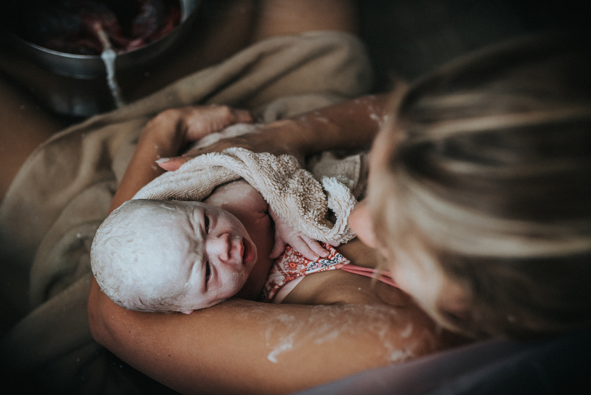 The benefits of vernix as portrayed in this birth captured by Los Angeles birth photographer Diana Hinek for Dear Birth