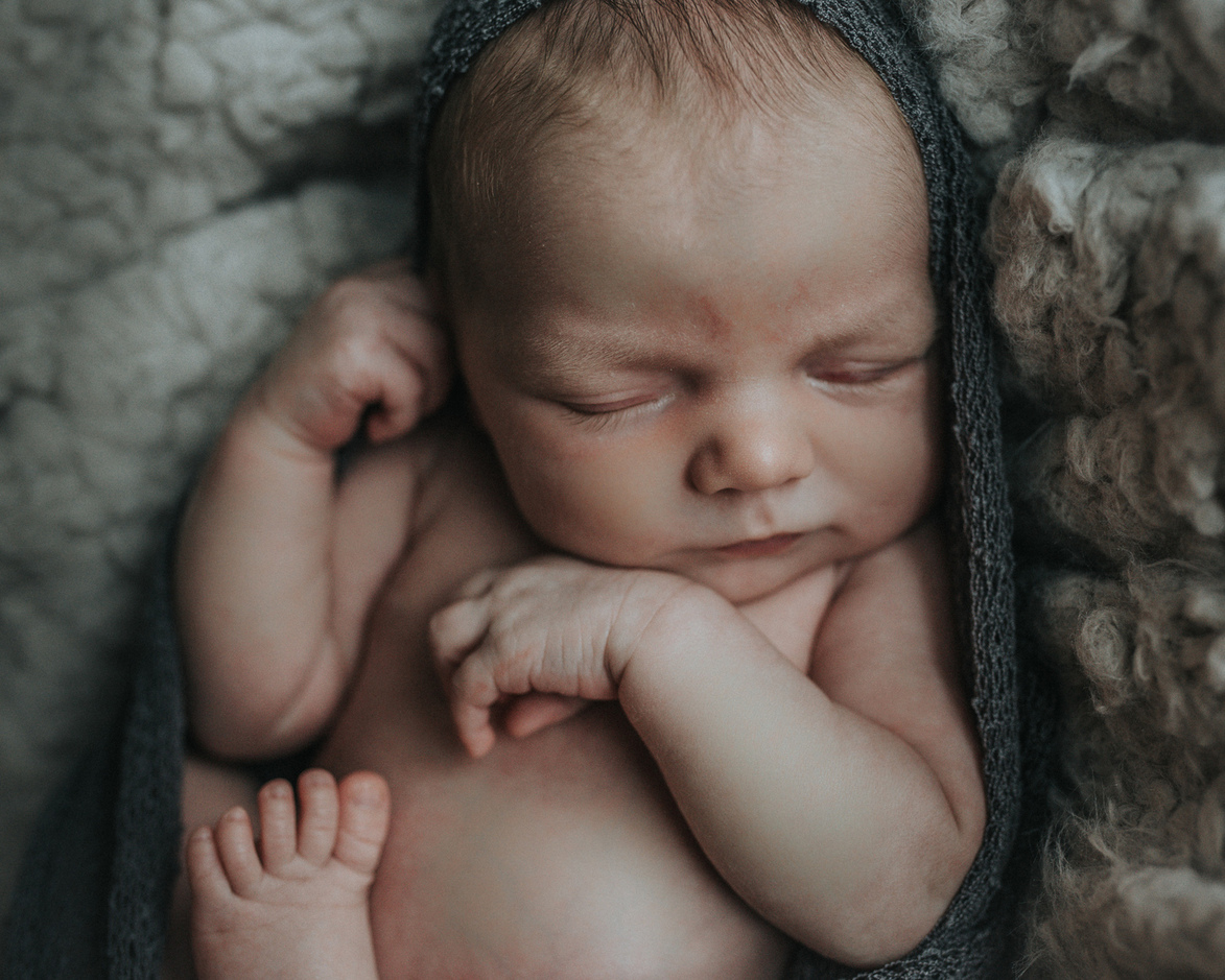 close up of newborn baby posed in blankets during newborn shoot with Los Angeles Pregnancy & Newborn Birth Photographer Diana Hinek for Dear Birth